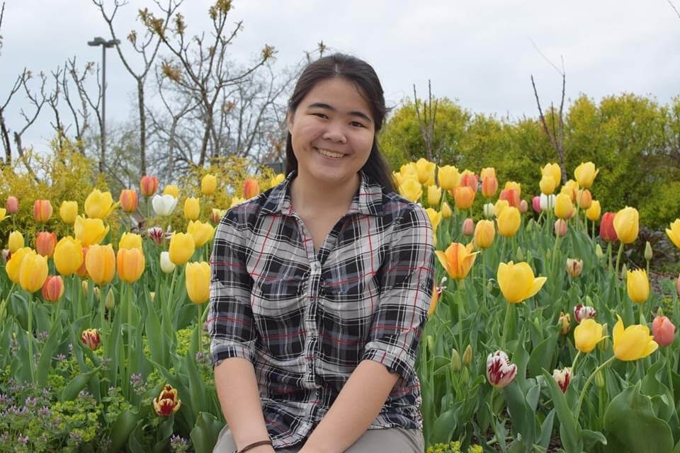 Sophia Puang in a tulip field